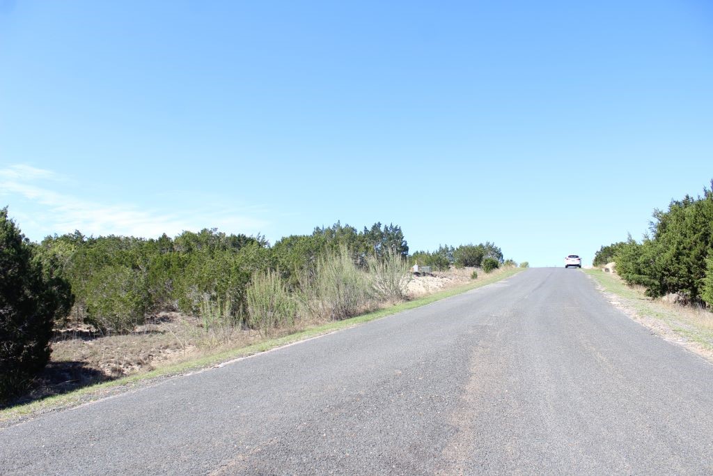 116 Oak Crest Drive Bertram, TX 78605 - Photo 32 of 39 Street front Lot on Left