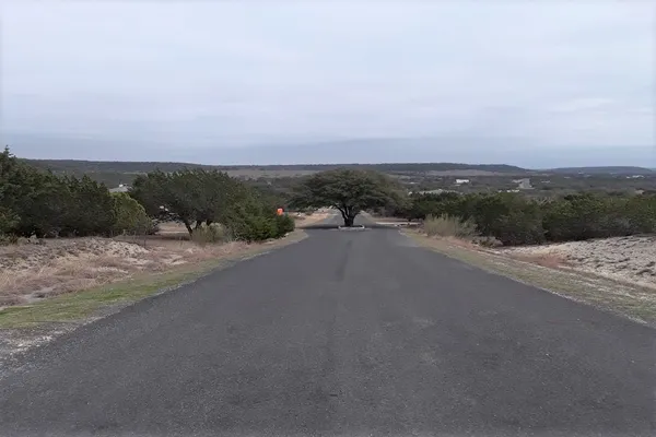 a view of a road with a city view