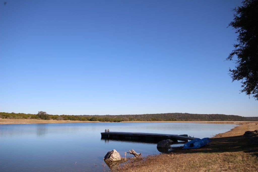 116 Oak Crest Drive Bertram, TX 78605 - Photo 5 of 39 16-Acre common area fishing Lake and pier