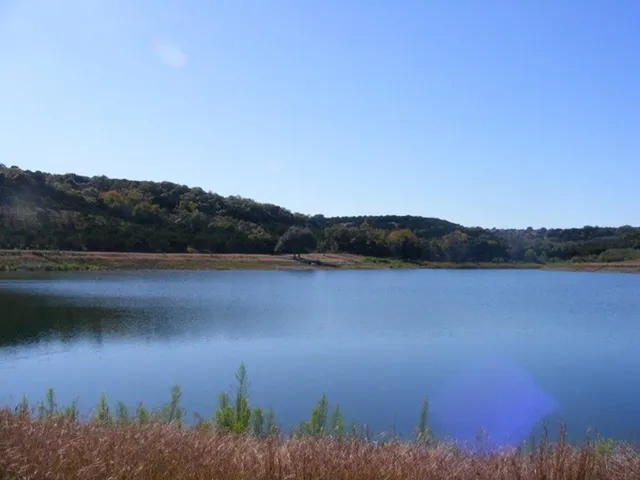 a view of lake and mountain