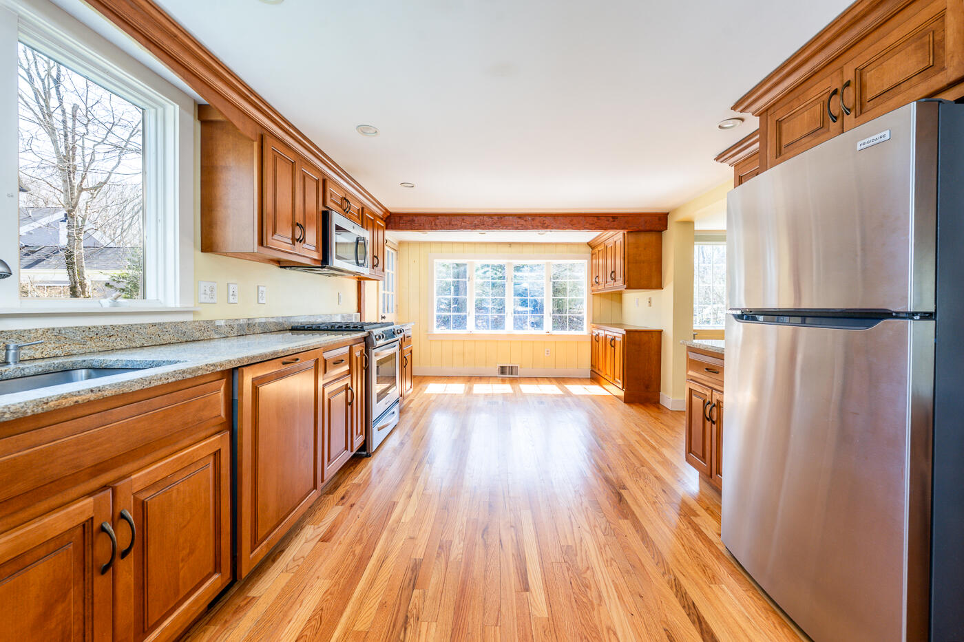 58 Pine Lane Barnstable, MA 02630 - Photo 11 of 37 a view of a kitchen with wooden floor and electronic appliances