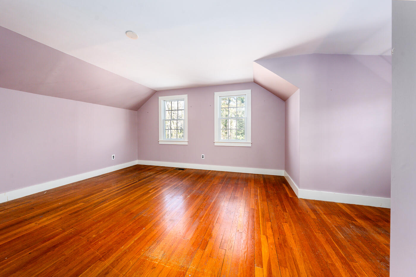 58 Pine Lane Barnstable, MA 02630 - Photo 27 of 37 an empty room with wooden floor and windows