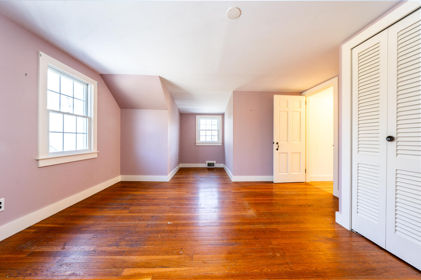 58 Pine Lane Barnstable, MA 02630 - Photo 28 of 37 a view of an empty room with window and wooden floor