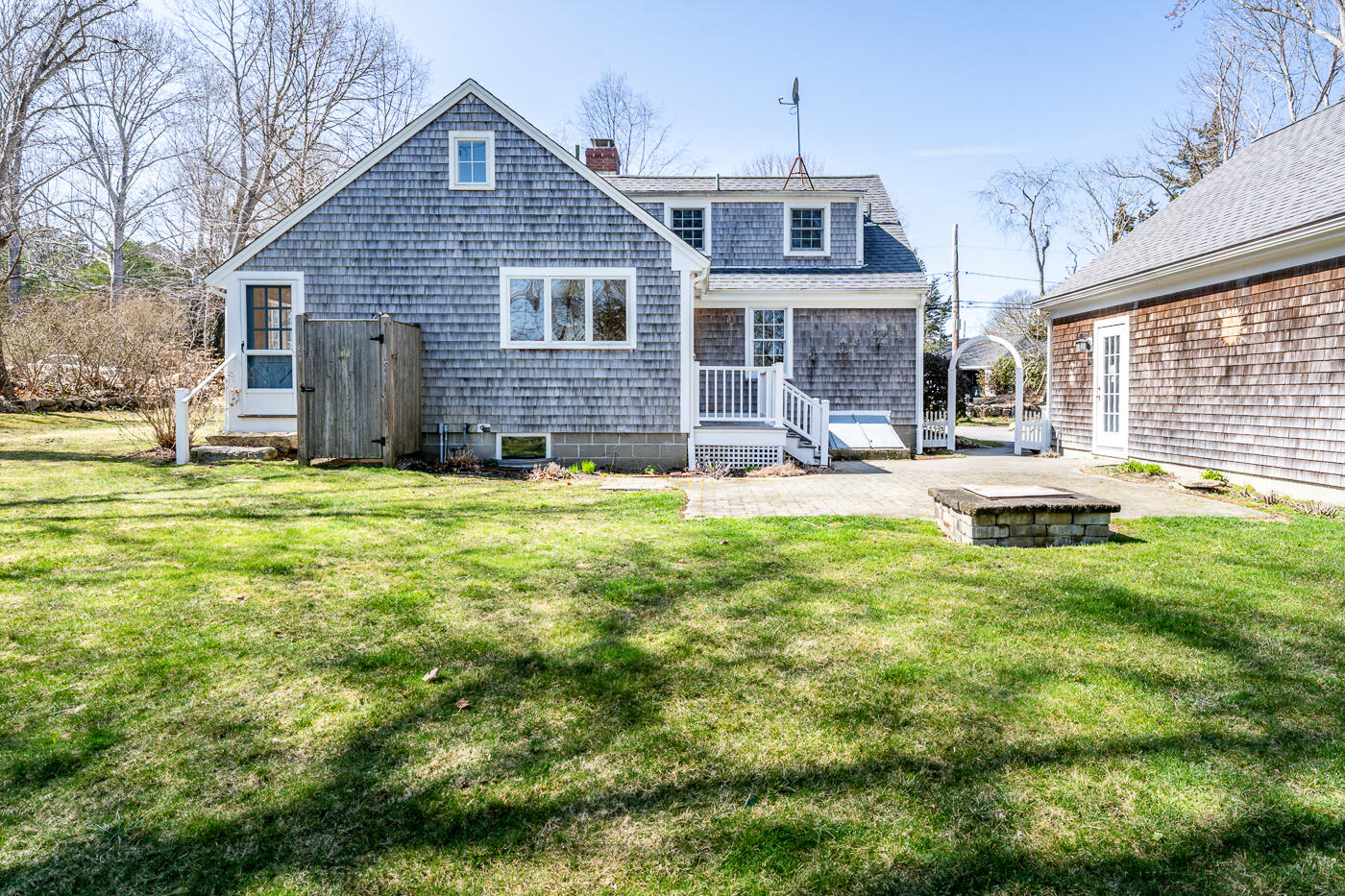 58 Pine Lane Barnstable, MA 02630 - Photo 31 of 37 a front view of a house with a yard