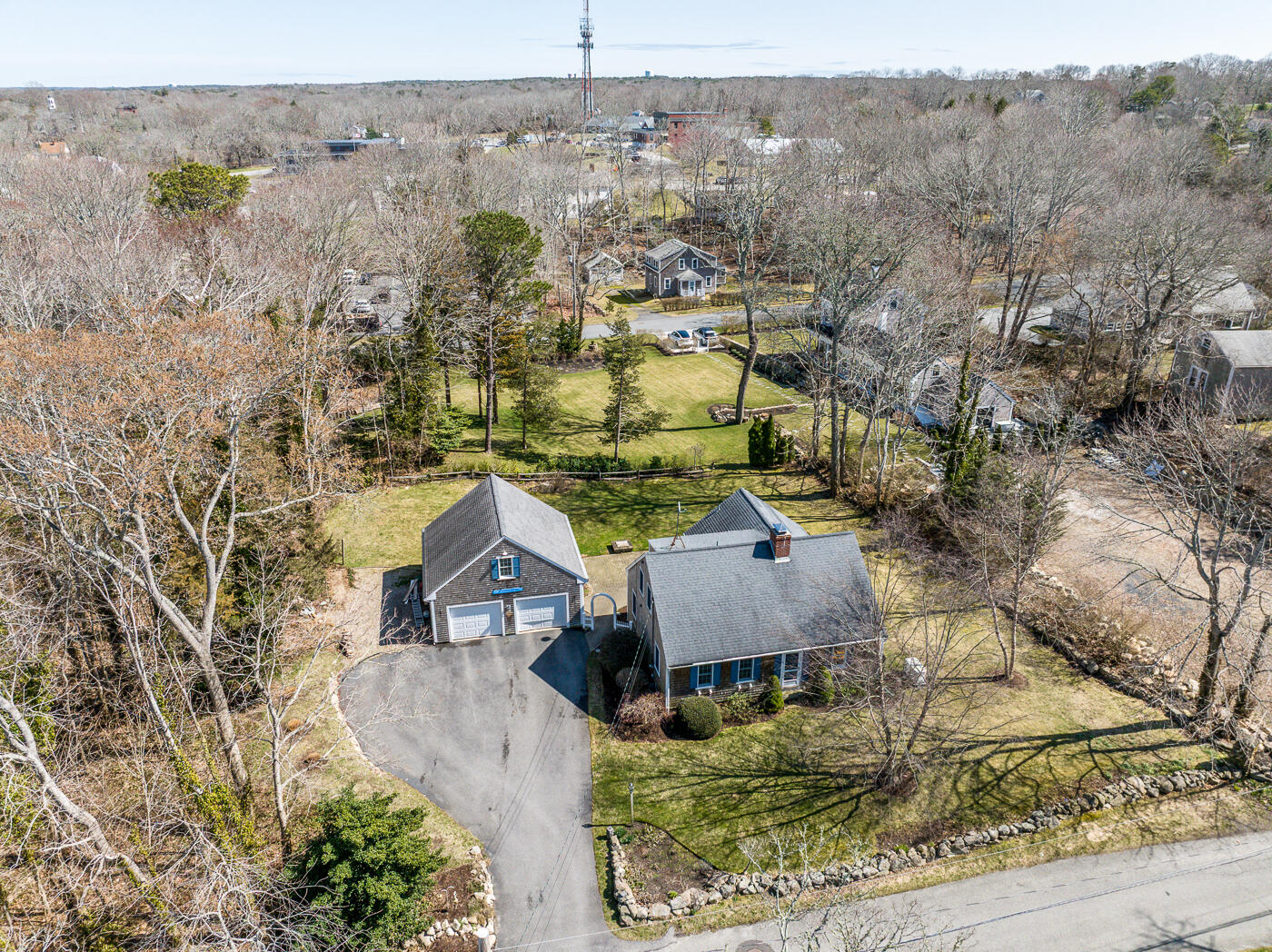 58 Pine Lane Barnstable, MA 02630 - Photo 33 of 37 an aerial view of residential houses with outdoor space and trees