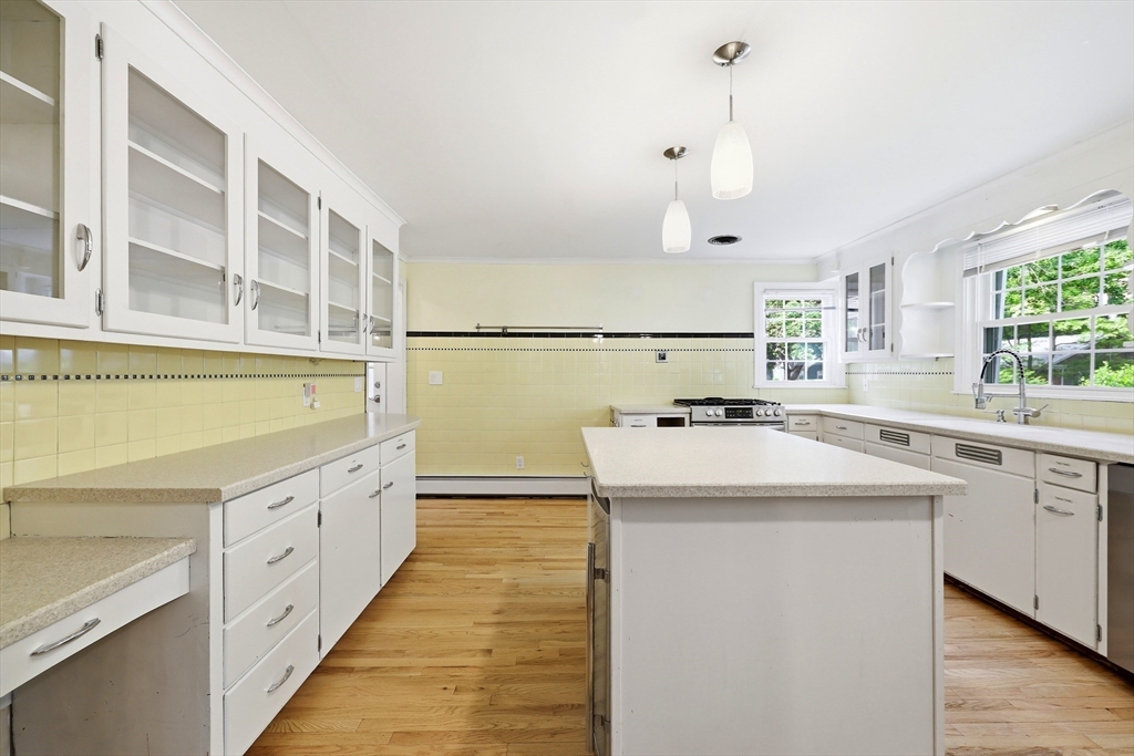 130 Connecticut Avenue Springfield, MA 01107 - Photo 20 of 40 a kitchen with white cabinets and white appliances
