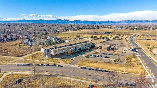 a view of a city with an ocean view
