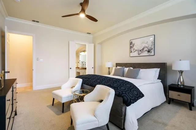 a large spacious bathroom with a tub sink and mirror