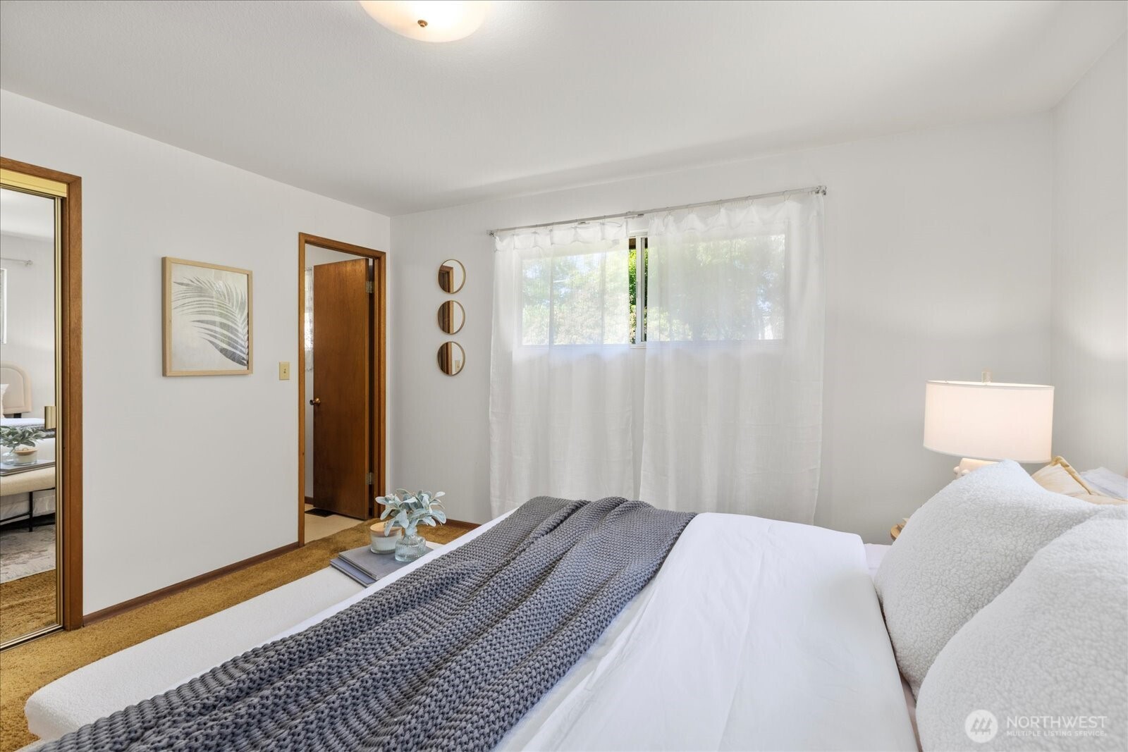 1420 Olympic Avenue Edmonds, WA 98020 - Photo 16 of 40 a bedroom with a bed and a window