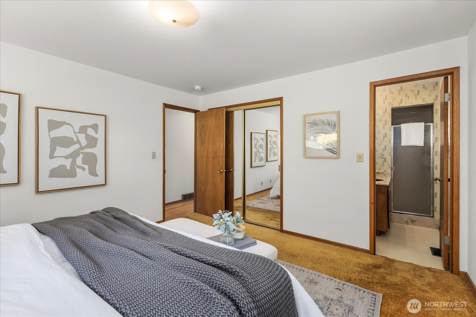 1420 Olympic Avenue Edmonds, WA 98020 - Photo 17 of 40 a bedroom with a bed and a painting on the wall