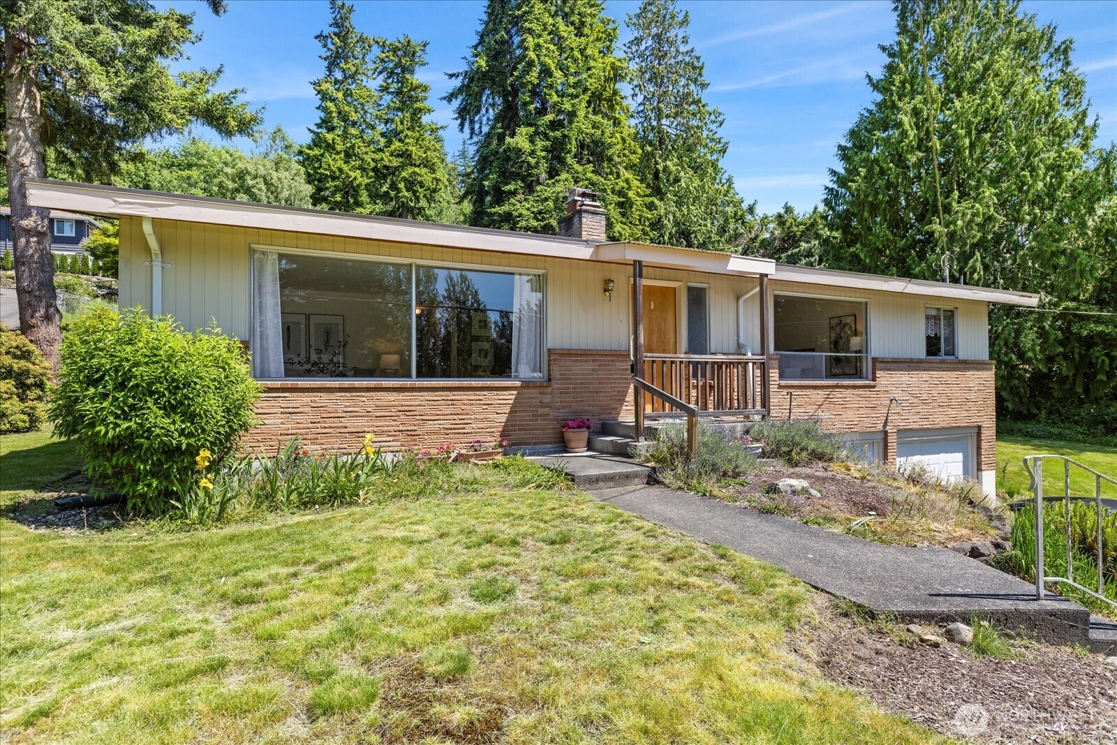 1420 Olympic Avenue Edmonds, WA 98020 - Photo 2 of 40 front view of a house with a patio