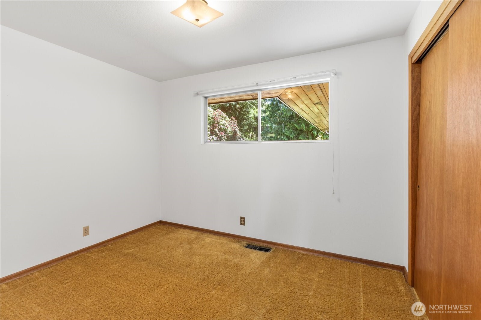 1420 Olympic Avenue Edmonds, WA 98020 - Photo 21 of 40 an empty room with a window and kitchen view