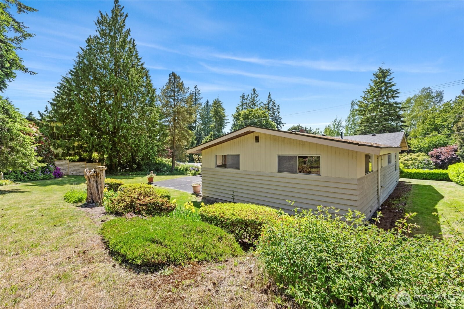 1420 Olympic Avenue Edmonds, WA 98020 - Photo 37 of 40 a front view of a house with garden