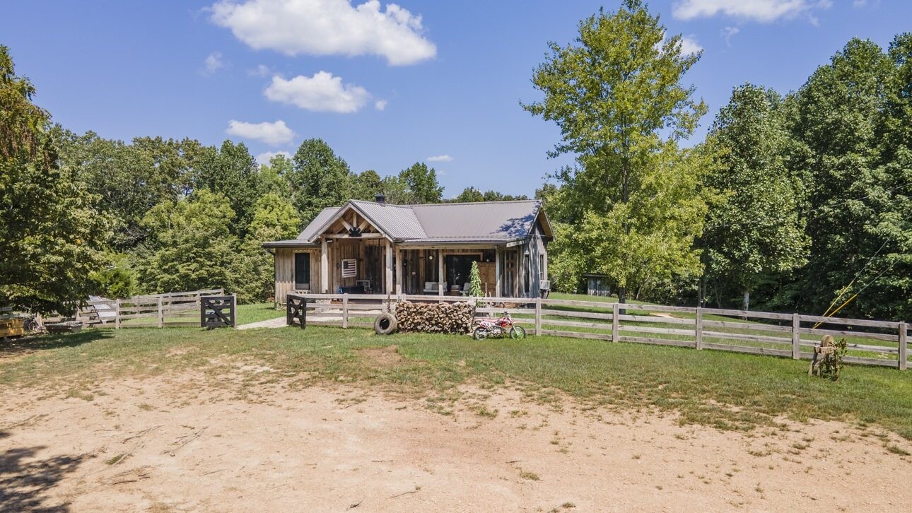 5656 Walter King Road Franklin, TN 37064 - Photo 11 of 36 a front view of a house with garden