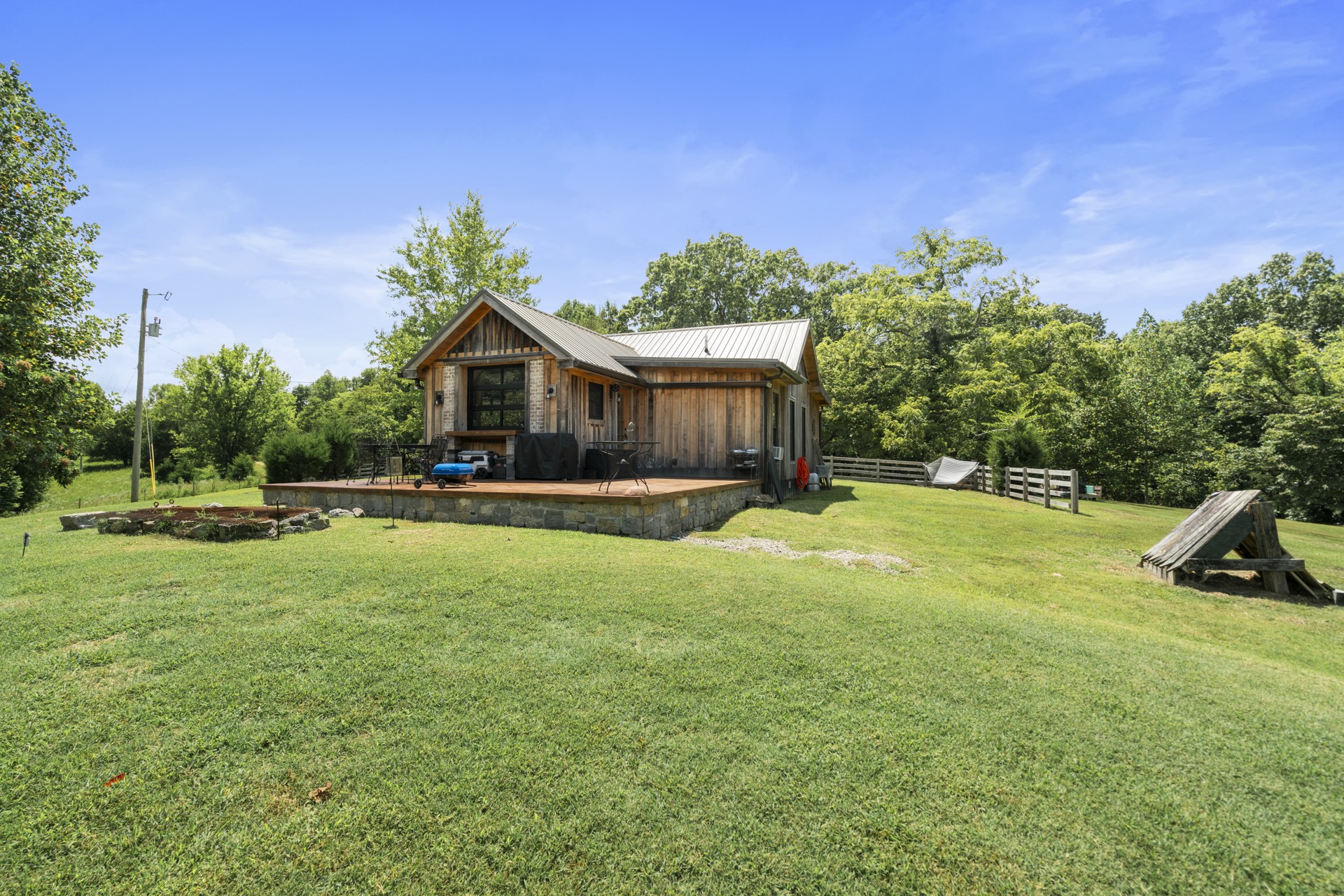 5656 Walter King Road Franklin, TN 37064 - Photo 15 of 36 a view of a house with a yard patio and swimming pool
