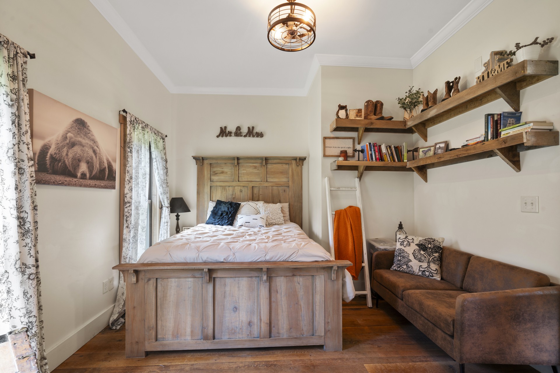 5656 Walter King Road Franklin, TN 37064 - Photo 23 of 36 a bedroom with a bed and a chandelier