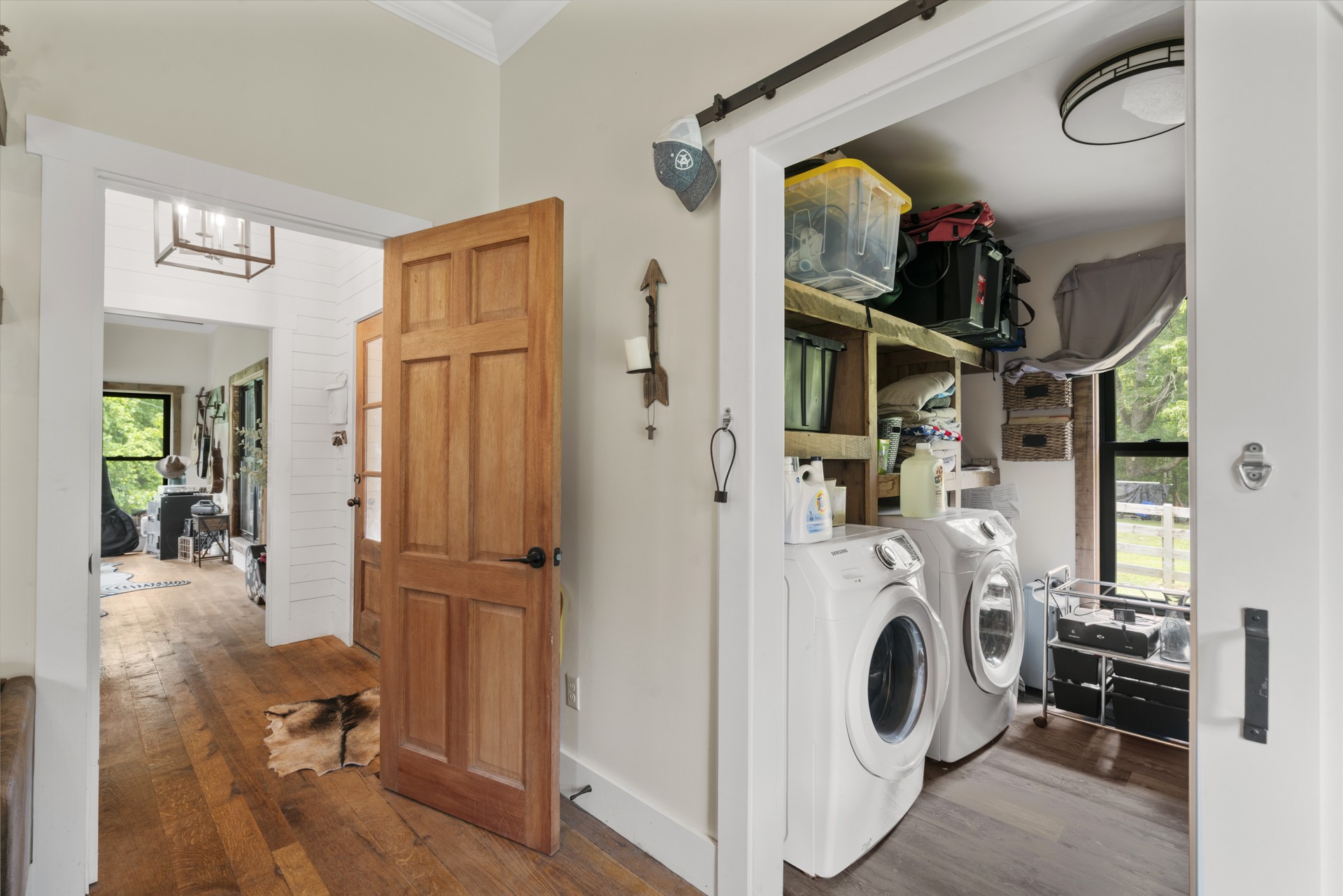 5656 Walter King Road Franklin, TN 37064 - Photo 24 of 36 a view of a hallway with washer and dryer