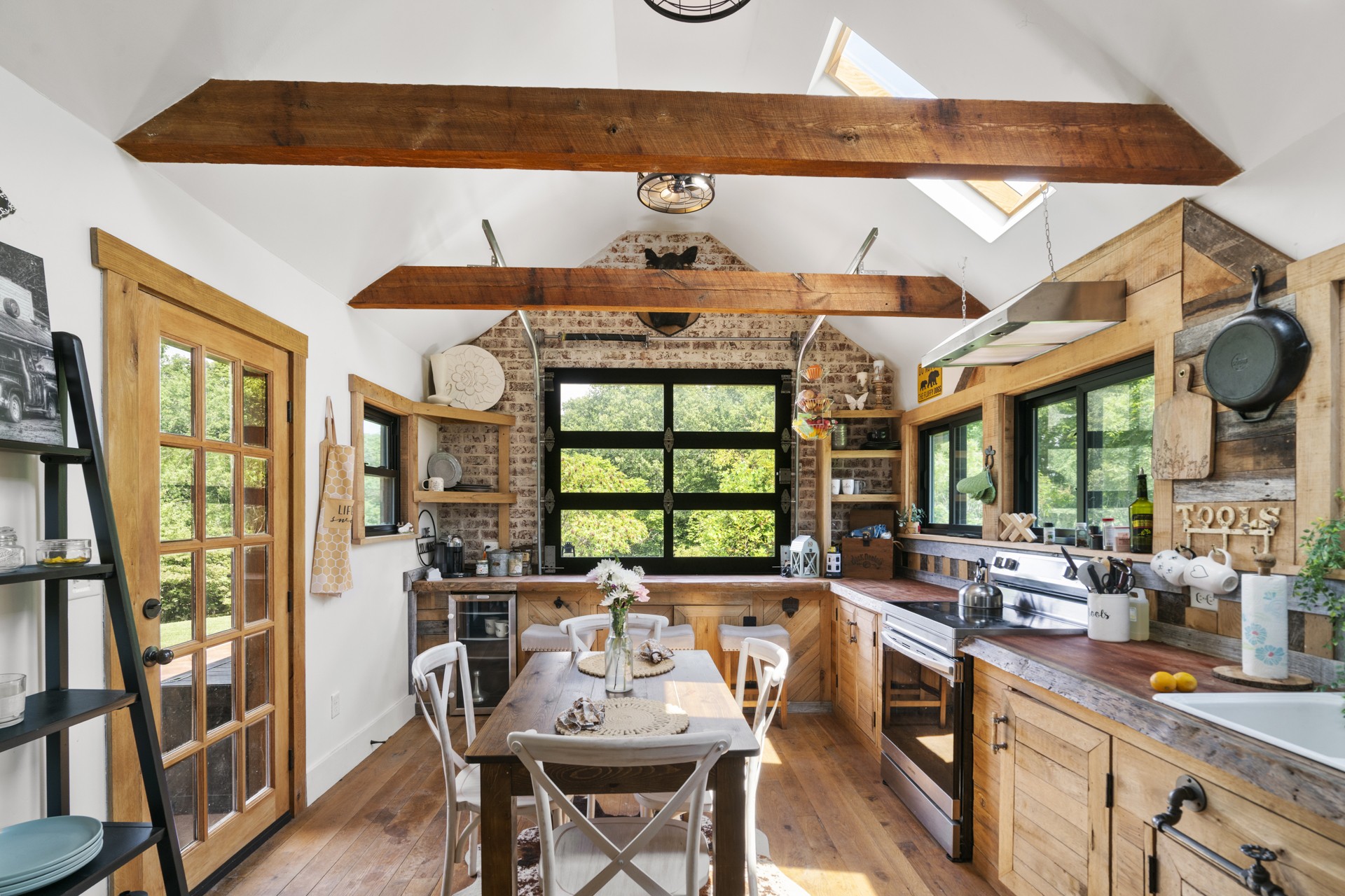 5656 Walter King Road Franklin, TN 37064 - Photo 29 of 36 a dining table with chairs and window