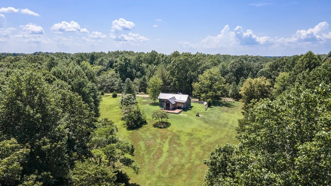 5656 Walter King Road Franklin, TN 37064 - Photo 4 of 36 a backyard of a house with lots of green space and mountain view