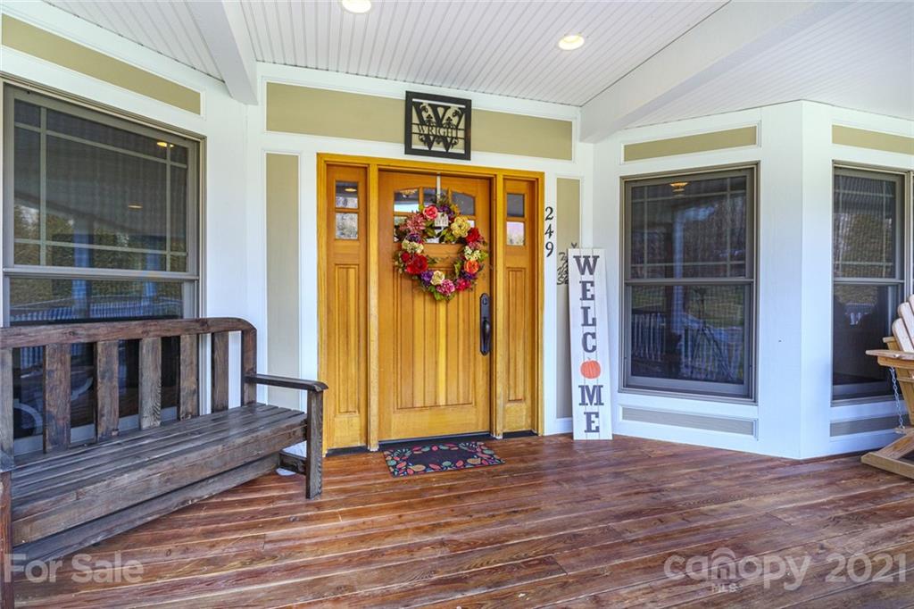 249 Ox Creek Road Weaverville, NC 28787 - Photo 31 of 32 a view of front door of house with stairs