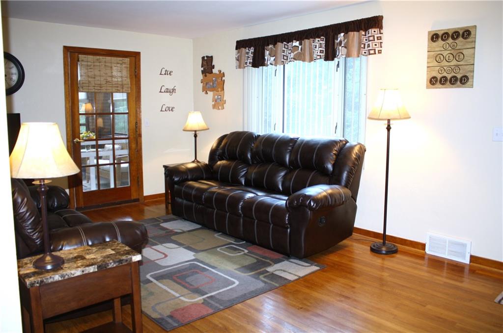 104 Buckhill Road Pittsburgh, PA 15237 - Photo 3 of 21 Living Room with easy access to enclosed porch.