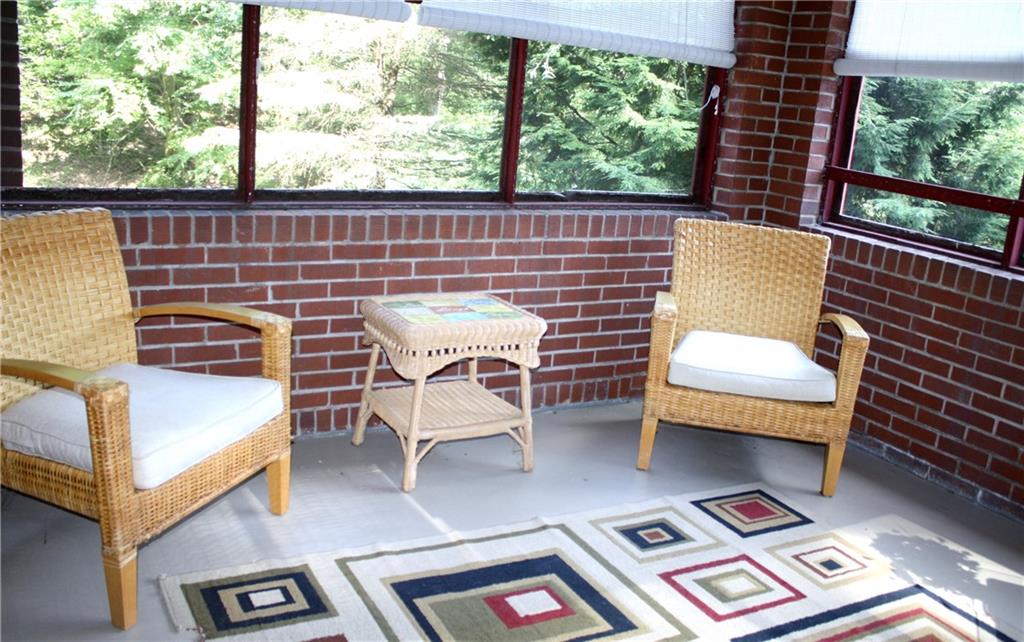 104 Buckhill Road Pittsburgh, PA 15237 - Photo 6 of 21 Enclosed Side Porch with lots of windows to enjoy the outdoors.