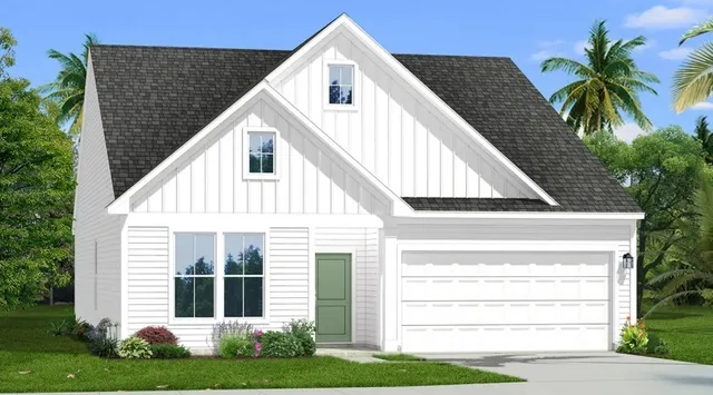 a view of house with yard