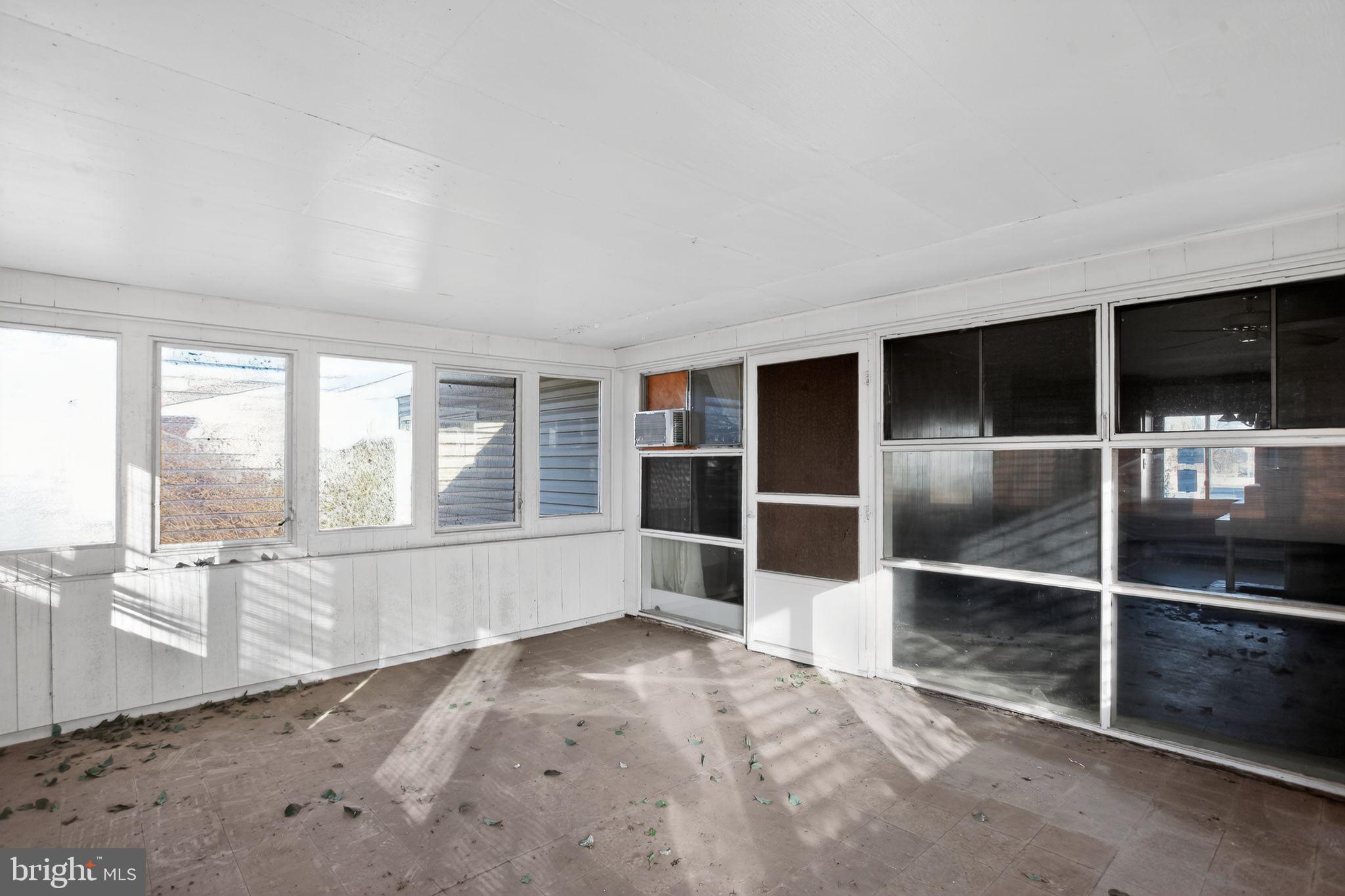 6 Field Lane Levittown, PA 19055 - Photo 16 of 20 an empty room with a empty space and windows