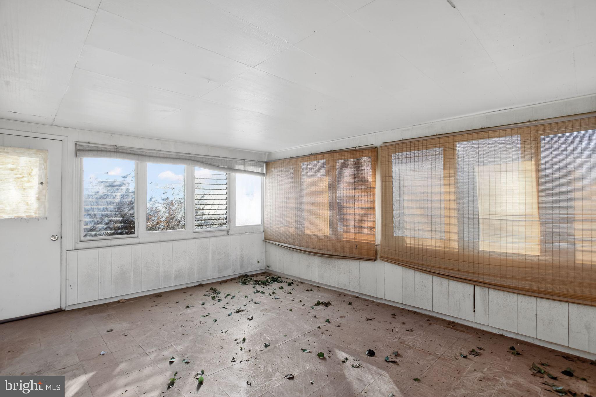 6 Field Lane Levittown, PA 19055 - Photo 17 of 20 a view of an empty room with a window