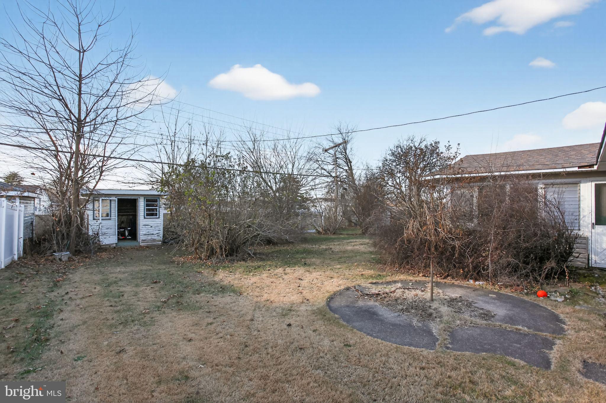 6 Field Lane Levittown, PA 19055 - Photo 3 of 20 a view of a backyard
