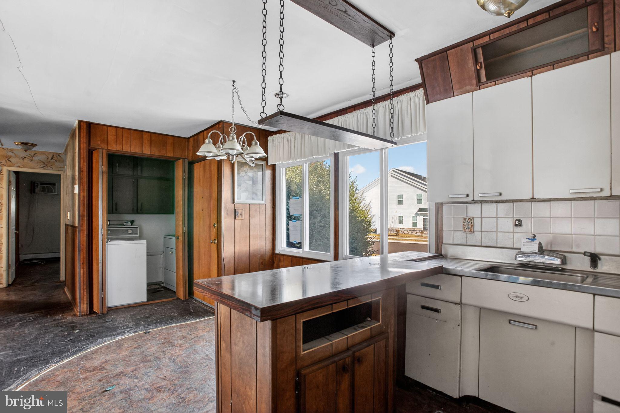 6 Field Lane Levittown, PA 19055 - Photo 4 of 20 a kitchen with a sink cabinets and window