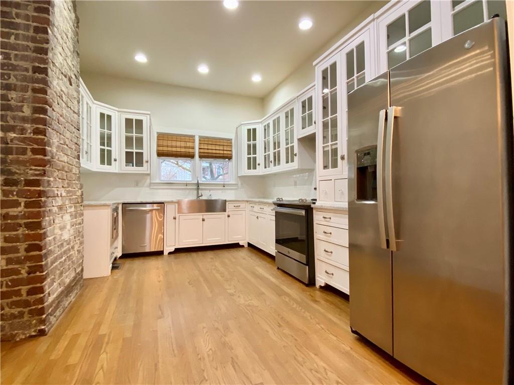 700 Magnolia Street Villa Rica, GA 30180 - Photo 1 of 1 a view of kitchen with stainless steel appliances granite countertop a stove and a refrigerator
