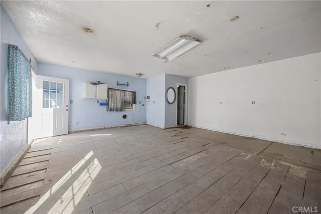 a view of a livingroom with wooden floor