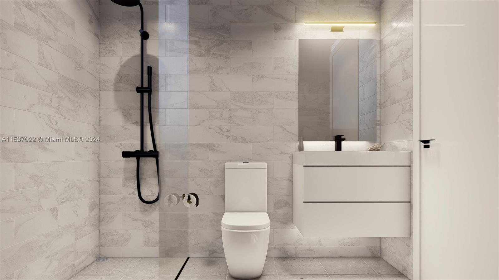 Flamingo-Lummus Miami Beach, FL 33139 - Photo 11 of 15 a bathroom with a toilet and a shower