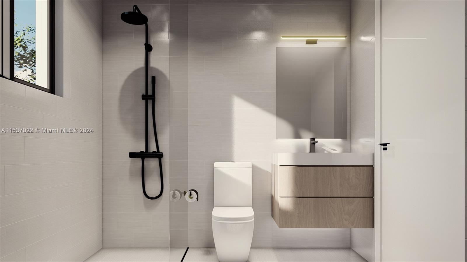 Flamingo-Lummus Miami Beach, FL 33139 - Photo 10 of 15 a bathroom with a toilet and a shower