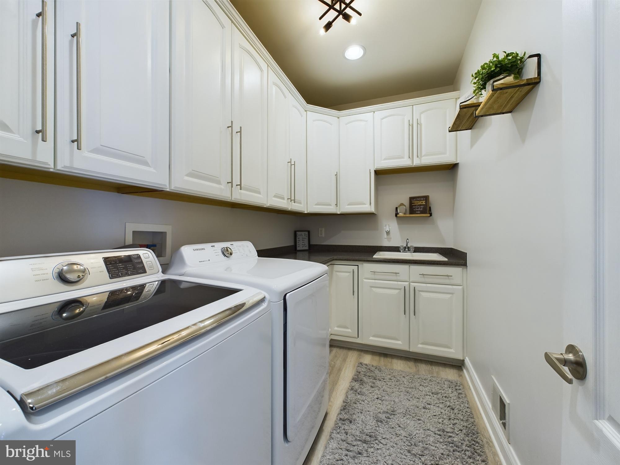 14601 Driftwood Road Bowie, MD 20721 - Photo 11 of 90 Bright and functional laundry space.