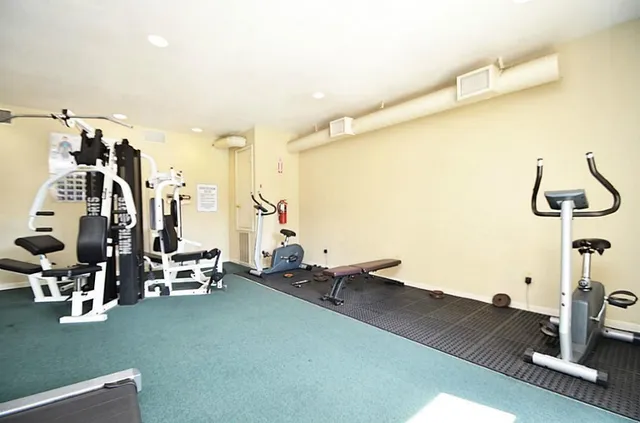 a view of a room with gym equipment