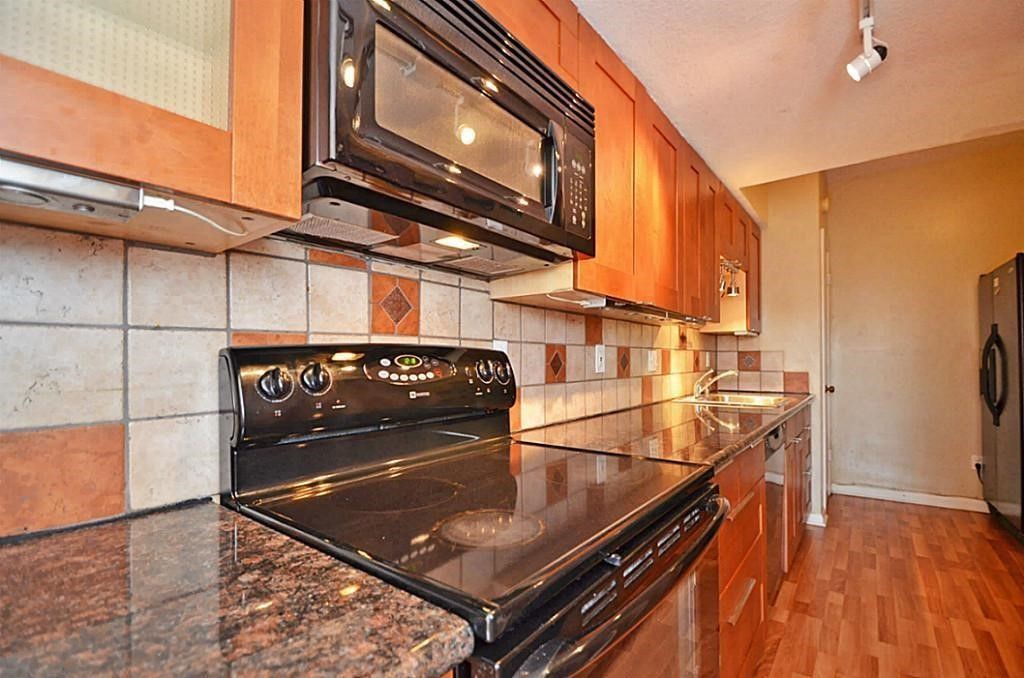 2100 Tanglewilde Street, Unit 351 Houston, TX 77063 - Photo 4 of 12 a view of a two chairs in the balcony