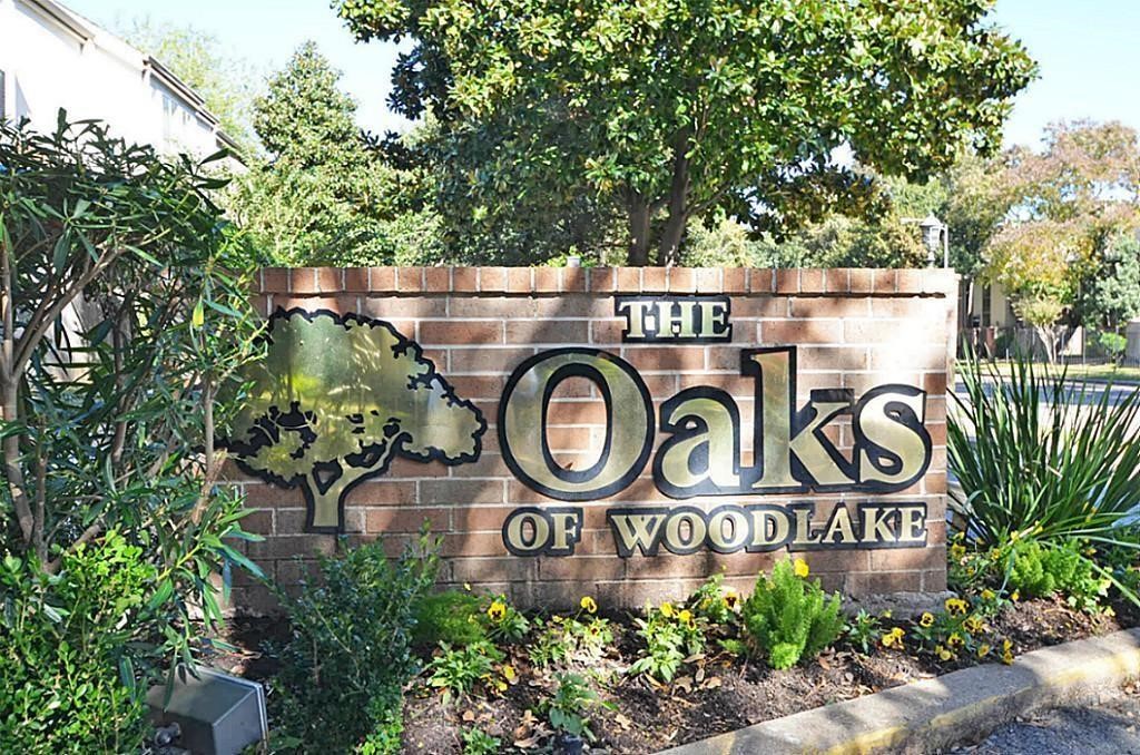 2100 Tanglewilde Street, Unit 351 Houston, TX 77063 - Photo 6 of 12 a sign that is sitting on a pole