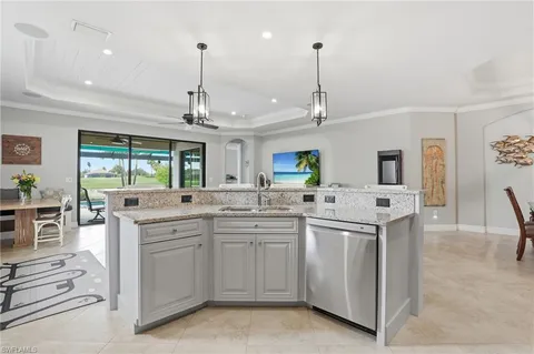 a kitchen with appliances cabinets and a sink