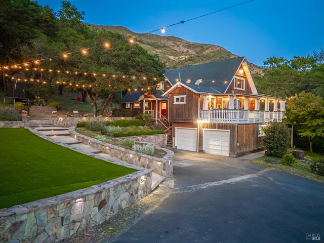 a view of a house with a big yard
