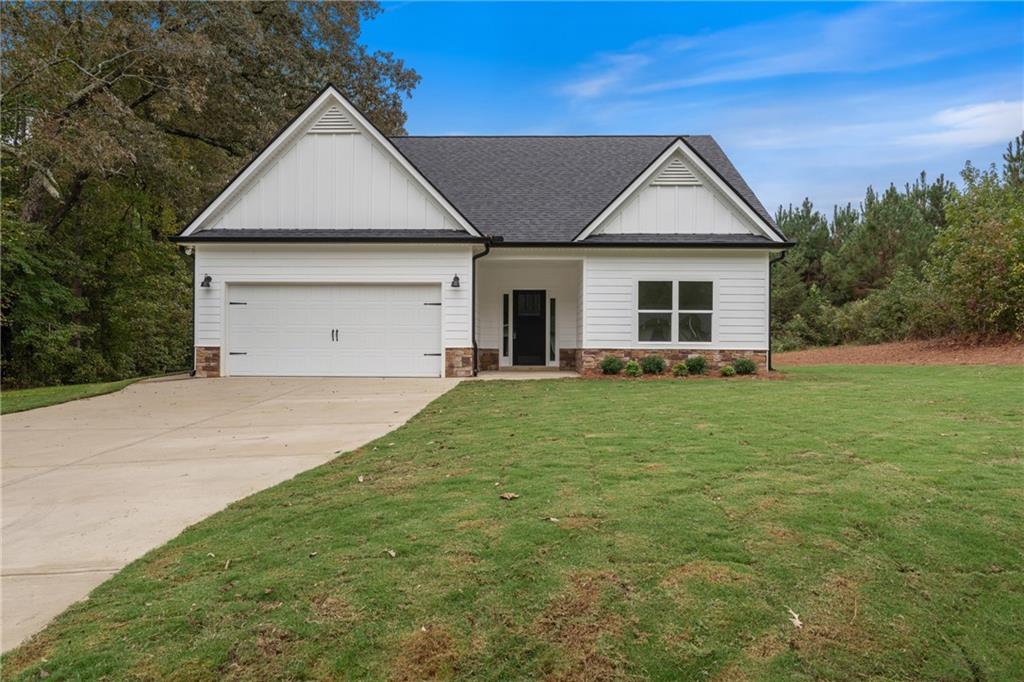front view of a house with a yard
