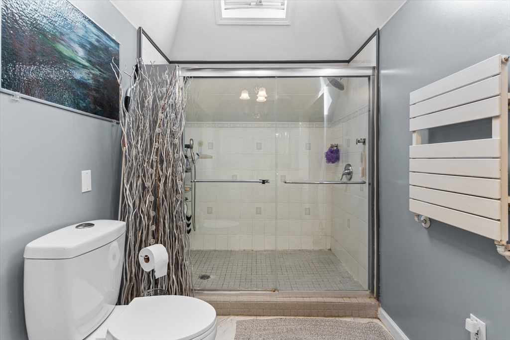 85 Folly Mill Road Salisbury, MA 01952 - Photo 29 of 40 a bathroom with a shower and a toilet