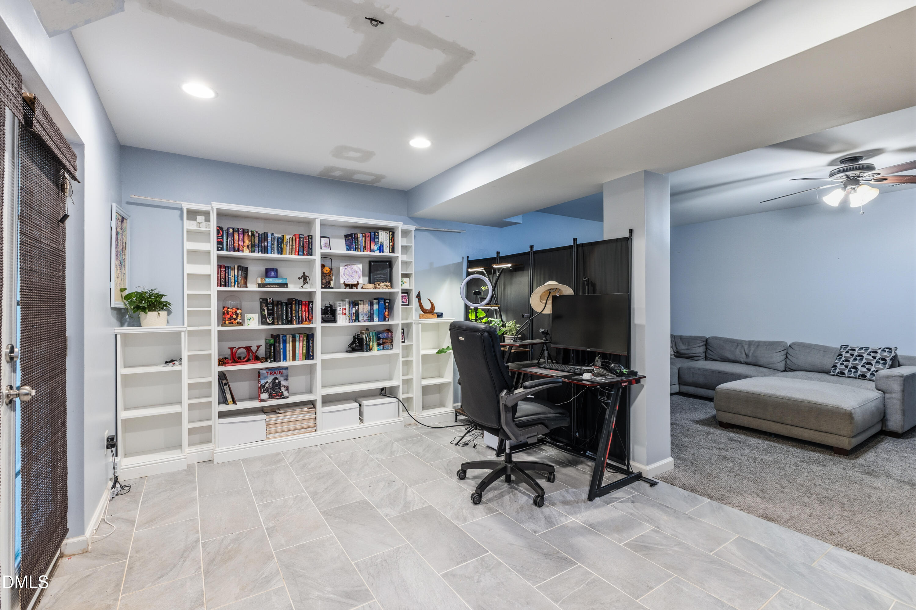 6125 Bellow Street Raleigh, NC 27609 - Photo 24 of 41 a view of a livingroom with workspace and a couch