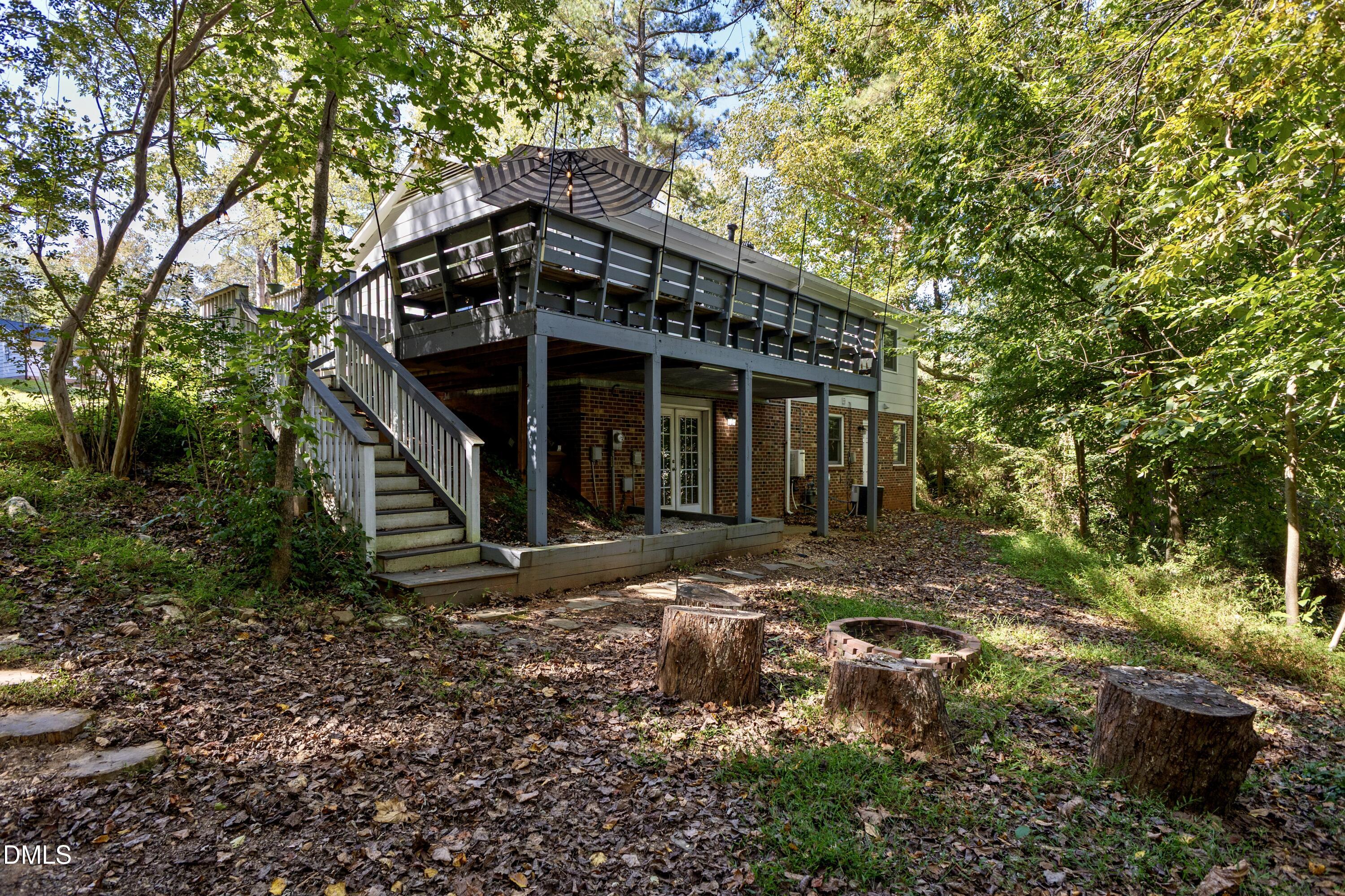 6125 Bellow Street Raleigh, NC 27609 - Photo 34 of 41 a view of a house with a yard