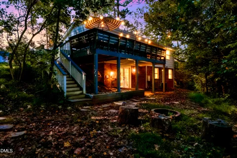 a backyard of a house with lots of green space