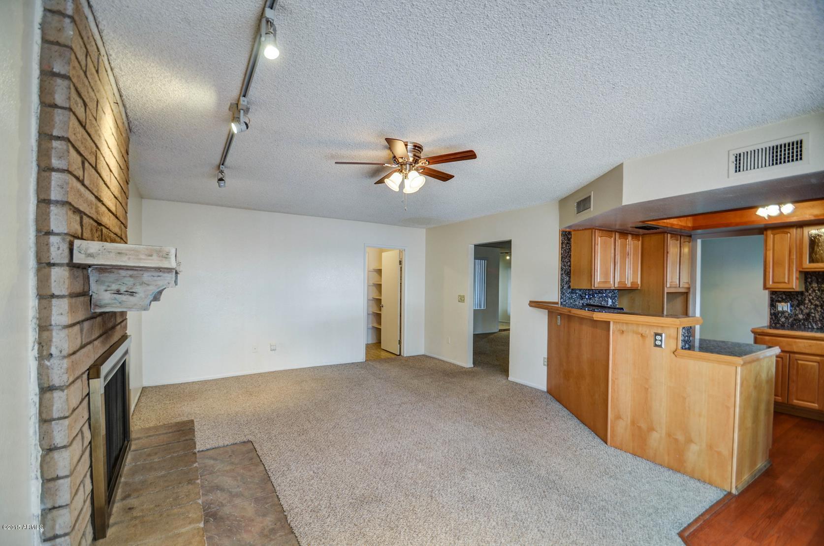 4233 West Ruth Avenue Phoenix, AZ 85051 - Photo 12 of 39 family room-1
