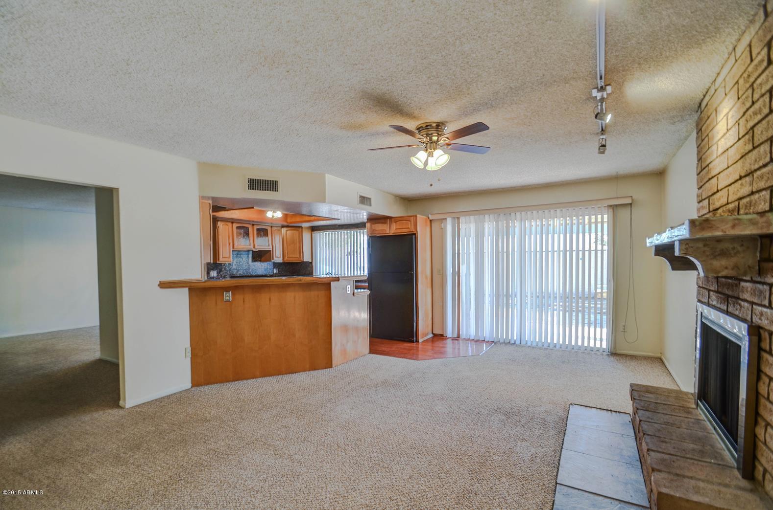 4233 West Ruth Avenue Phoenix, AZ 85051 - Photo 14 of 39 family room-3