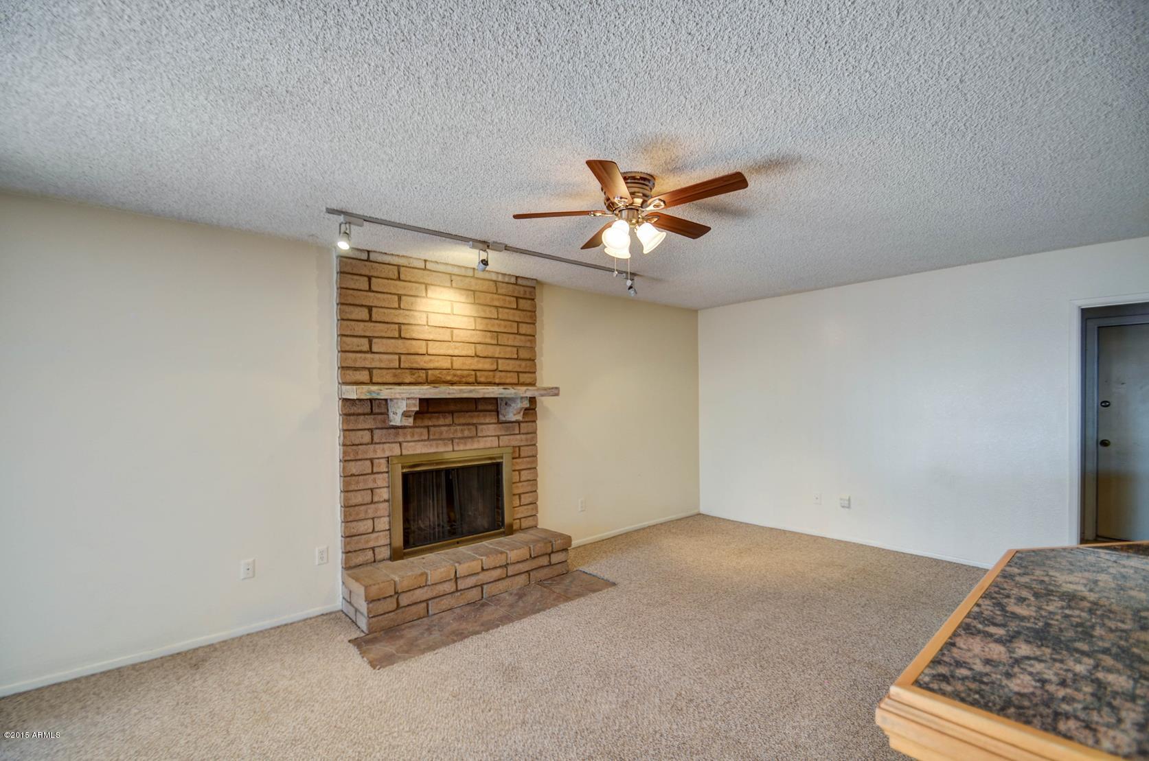 4233 West Ruth Avenue Phoenix, AZ 85051 - Photo 16 of 39 family room-5