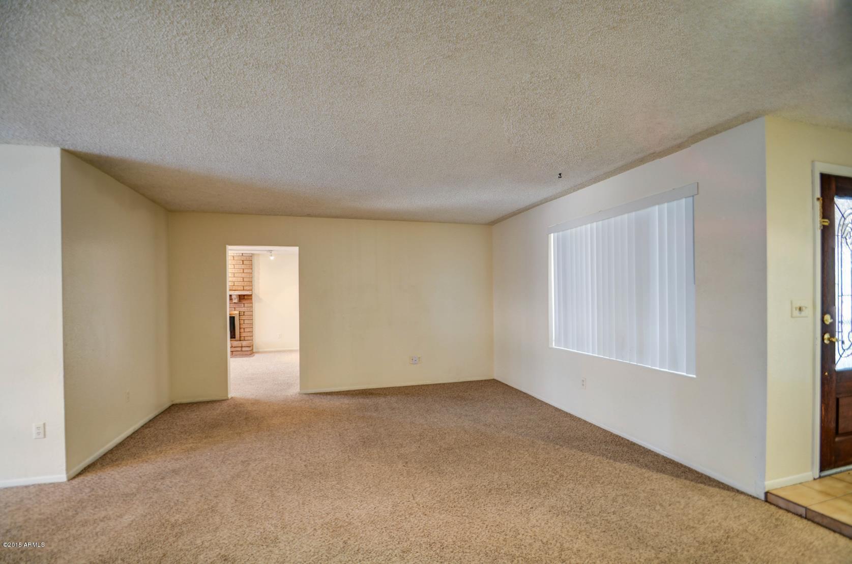 4233 West Ruth Avenue Phoenix, AZ 85051 - Photo 6 of 39 living room-1